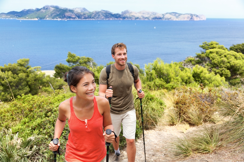 Happy couple hiking in Mallorca